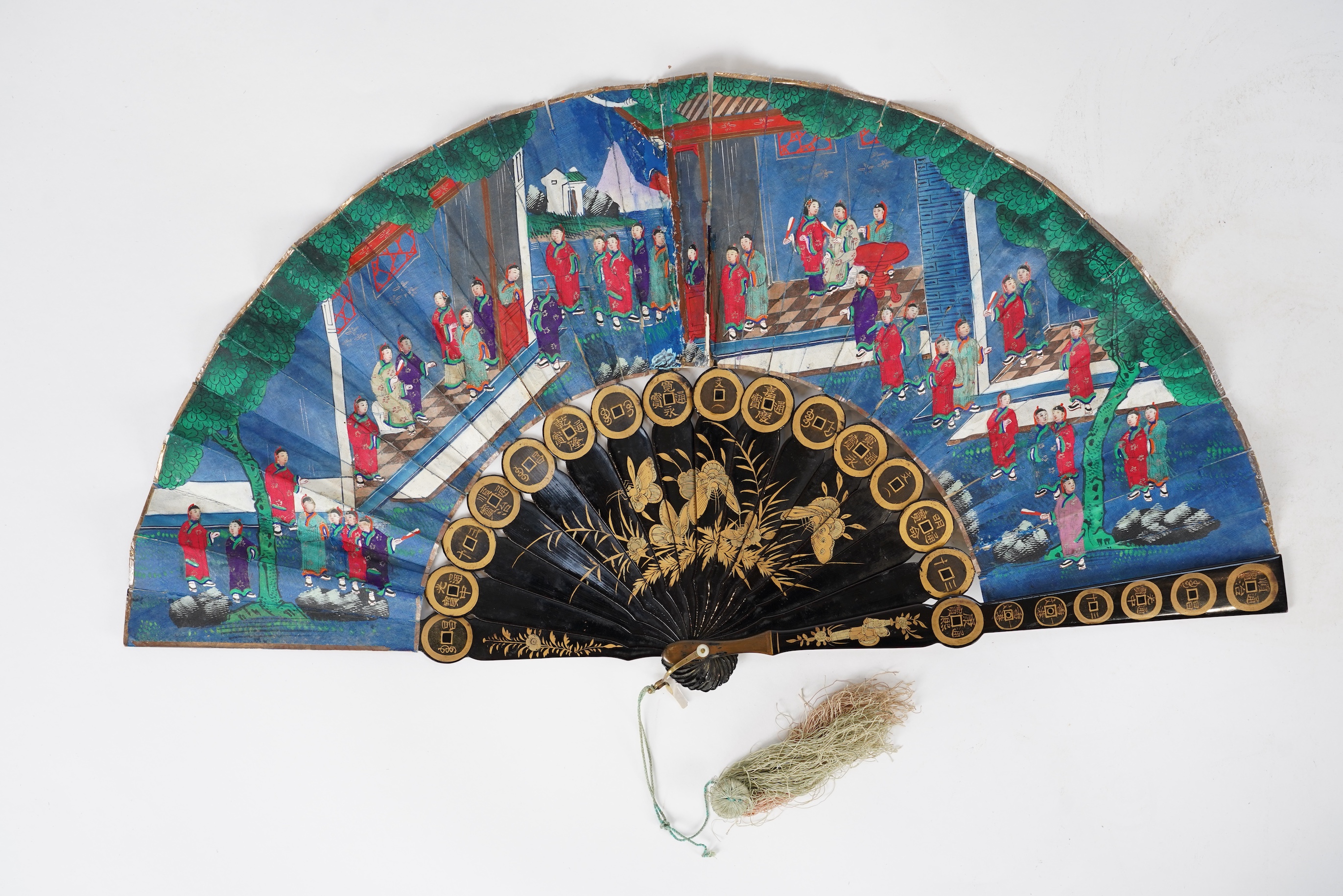Three Chinese gilt-decorated black lacquer and painted leaf fans, 19th century
